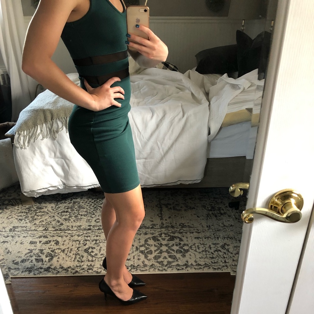 Green mini dress with black mesh